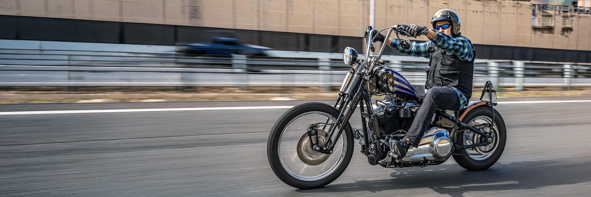 Custom motorcycle photographed in motion